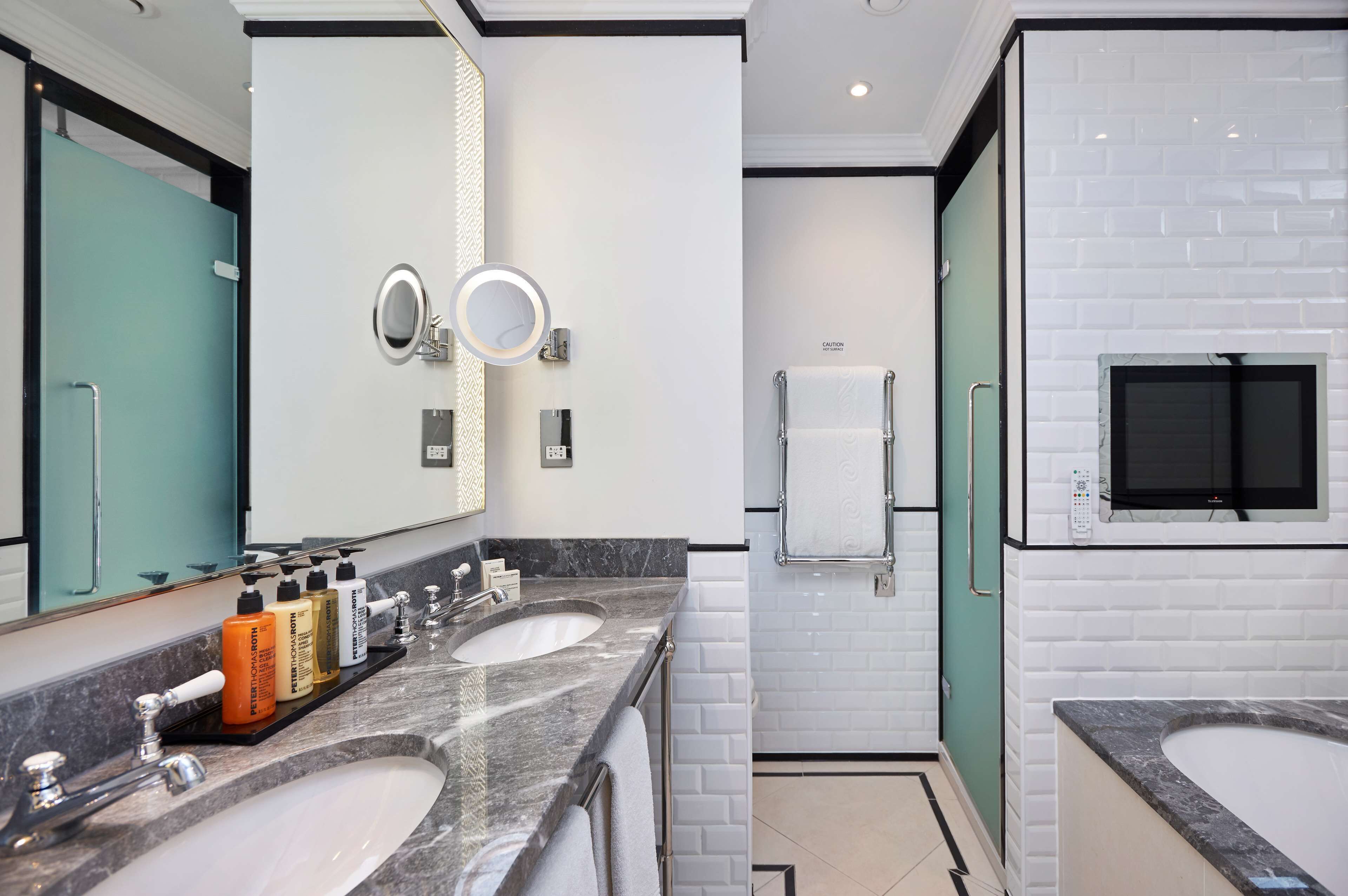 suite, 1 king bed (astor, four-poster bed) | bathroom | combined shower/bathtub, free toiletries, hair dryer, towels