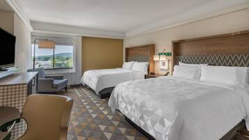 Hypo-allergenic bedding, desk, laptop workspace, blackout curtains