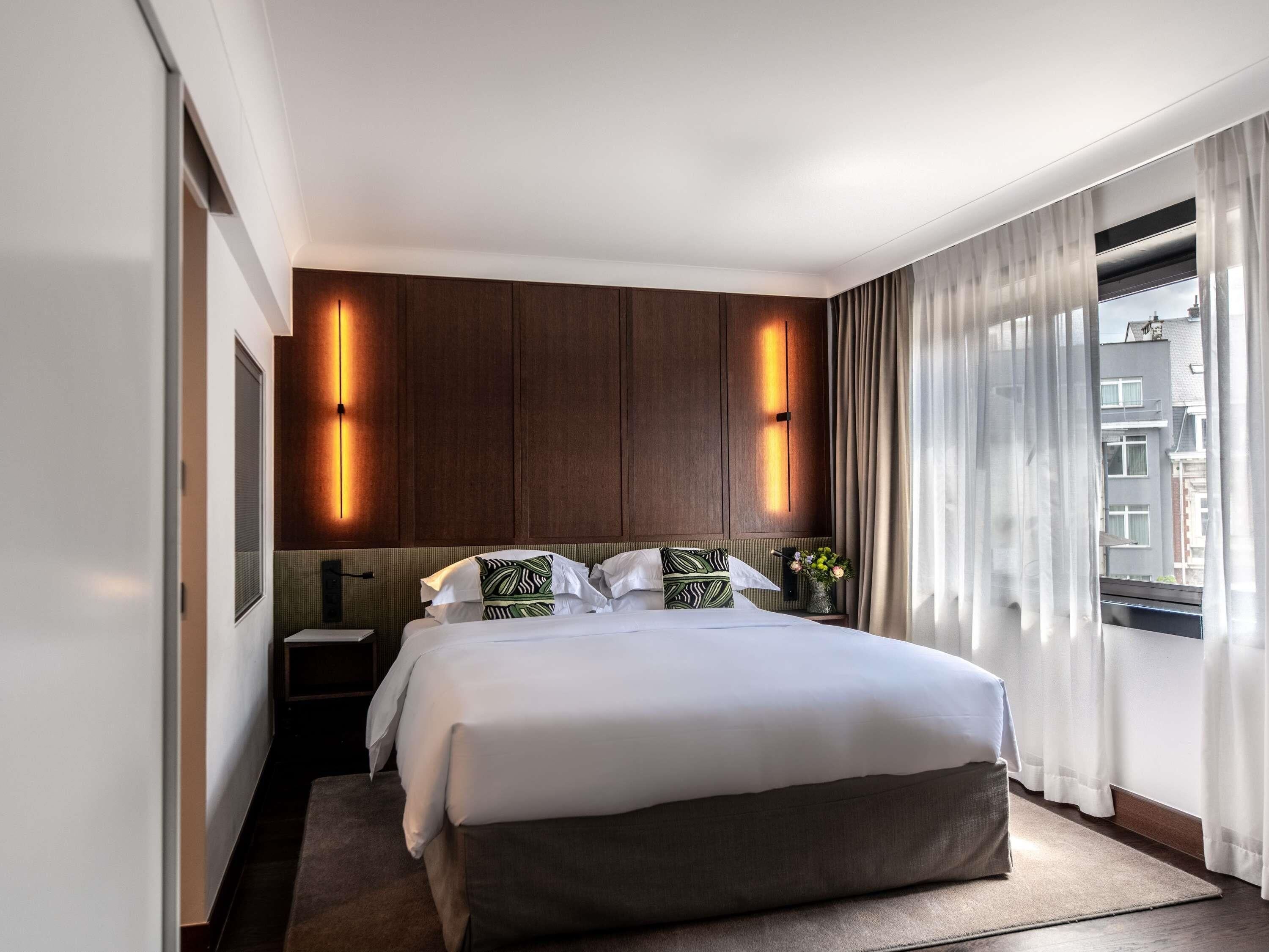 Premium bedding, down duvets, pillow-top beds, free minibar