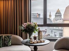 Premium bedding, down duvets, pillow-top beds, free minibar