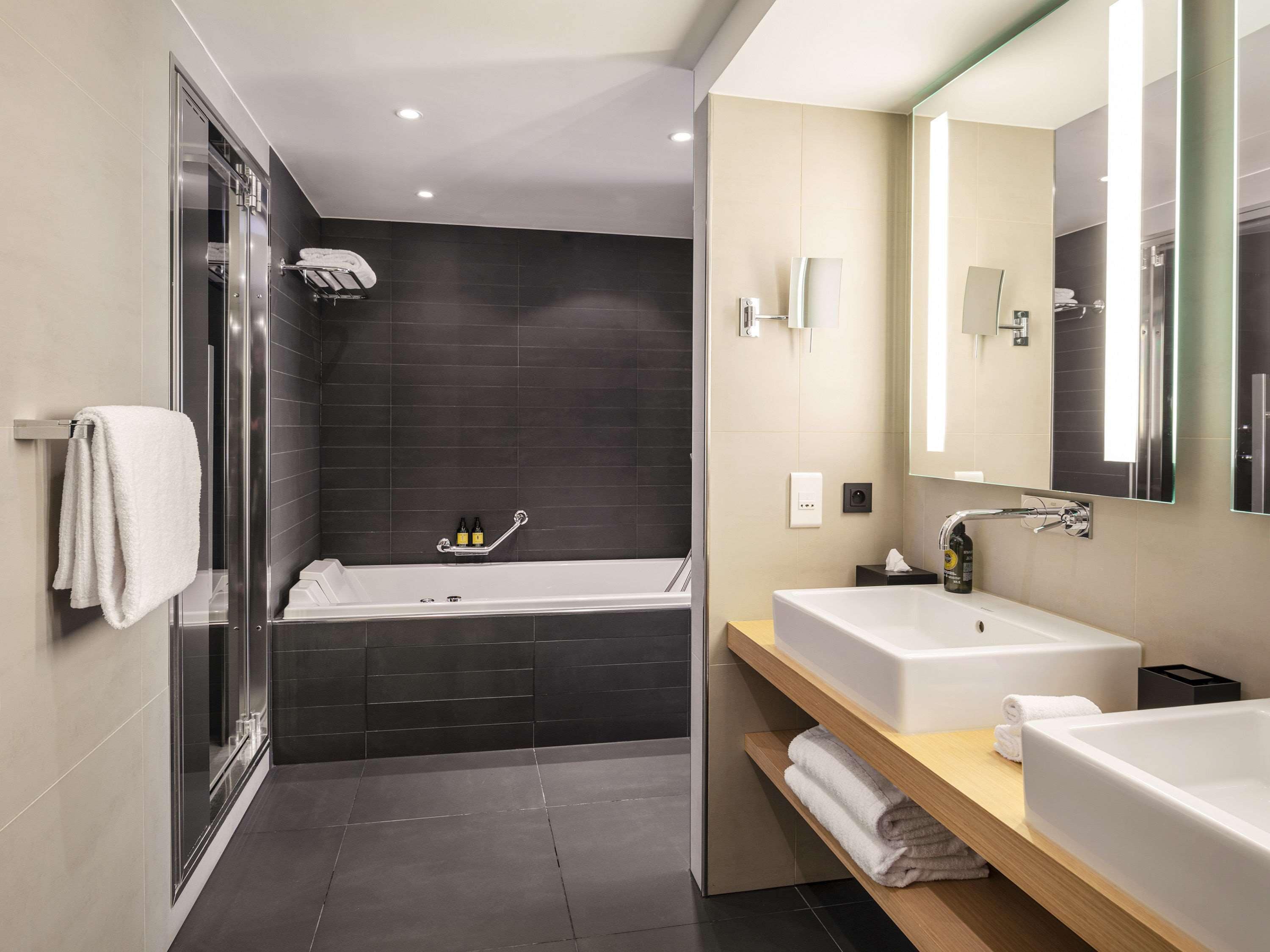 suite (le louise, garden and city view) | bathroom | rainfall showerhead, designer toiletries, hair dryer, bathrobes