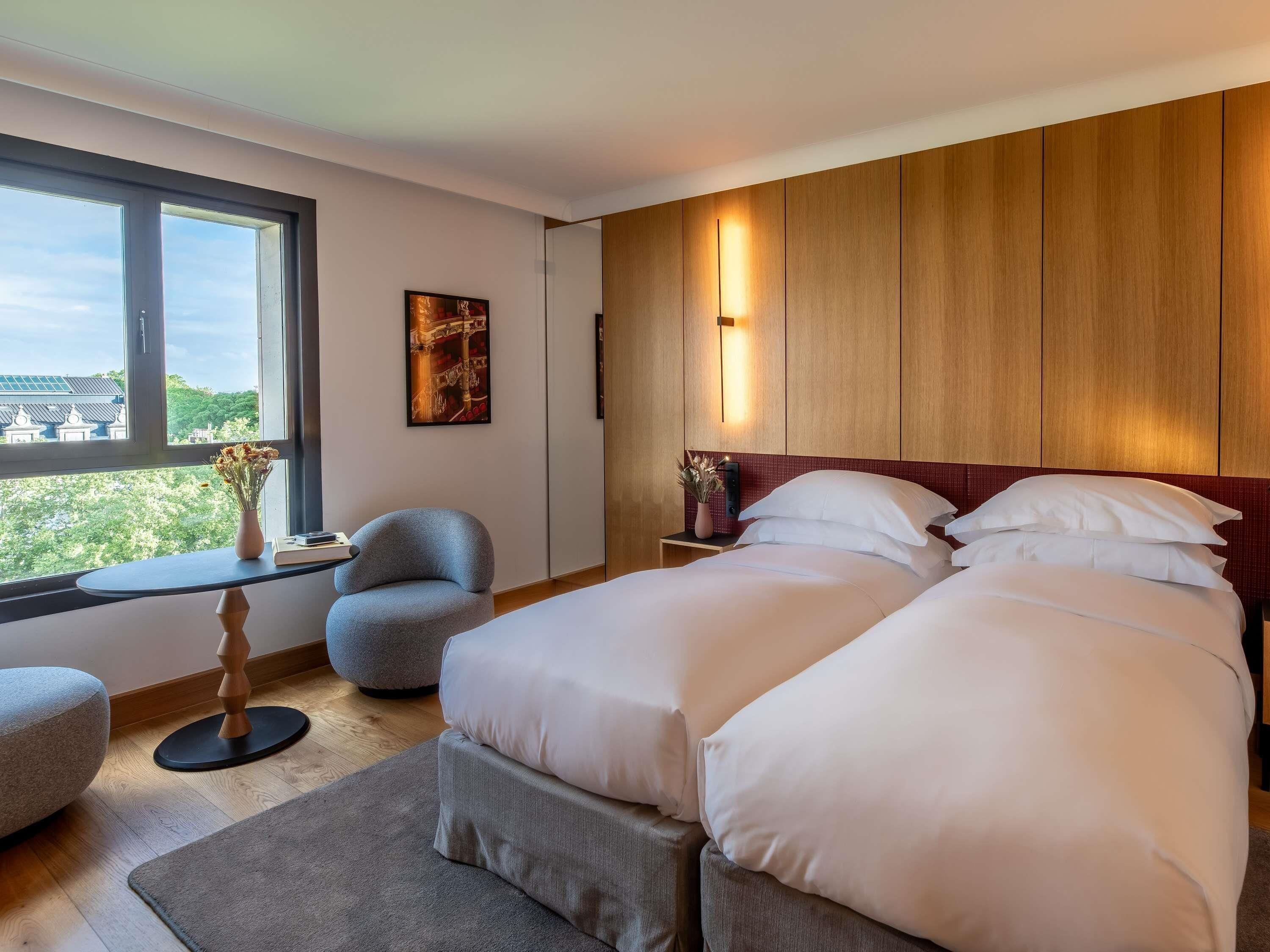 Premium bedding, down duvets, pillow-top beds, free minibar