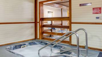 Indoor pool, open 7 AM to 10 PM, sun loungers