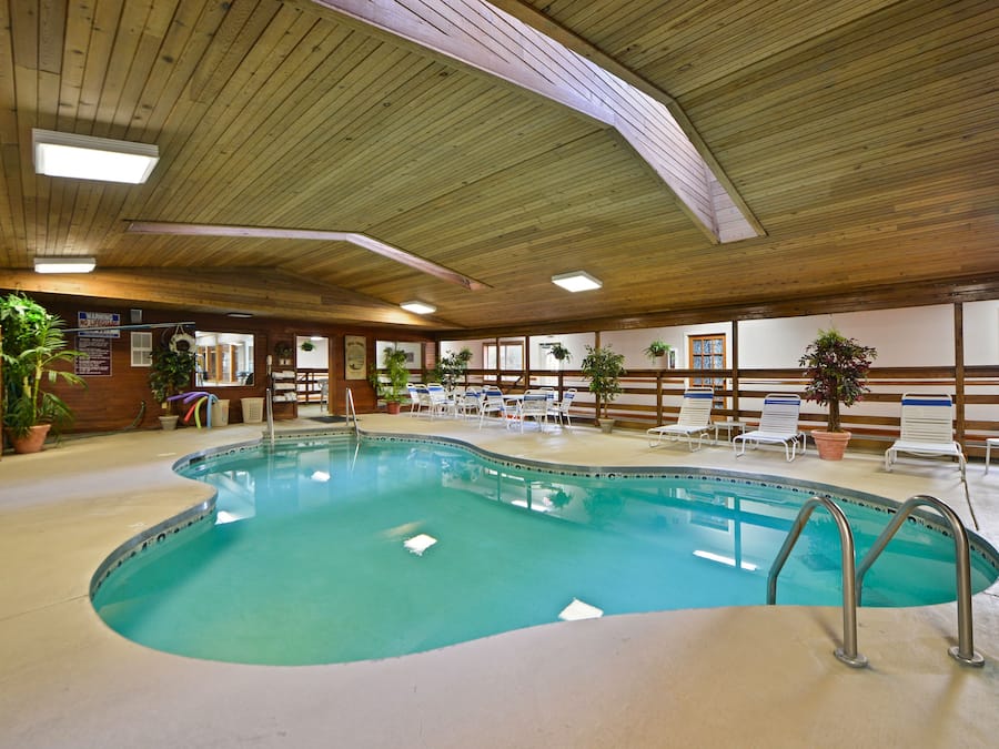 Indoor pool, open 7 AM to 10 PM, pool loungers