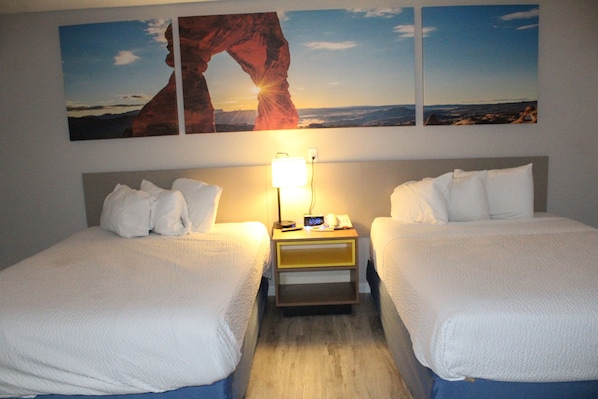 Suite, 2 Queen Beds, Non Smoking | Desk, free cribs/infant beds, rollaway beds, free WiFi