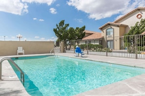 Seasonal outdoor pool, open 11:00 AM to 11:00 PM, sun loungers