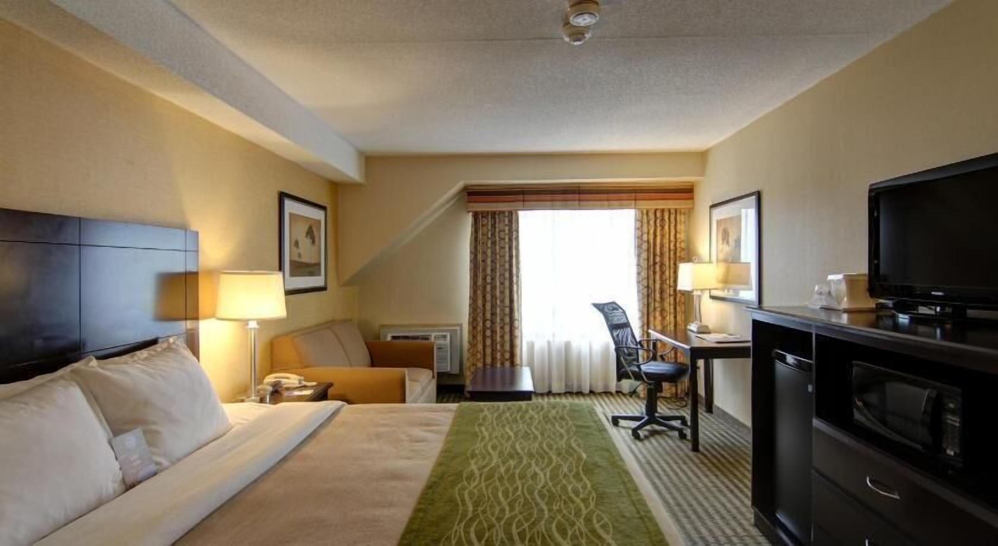 Premium bedding, desk, blackout drapes, iron/ironing board