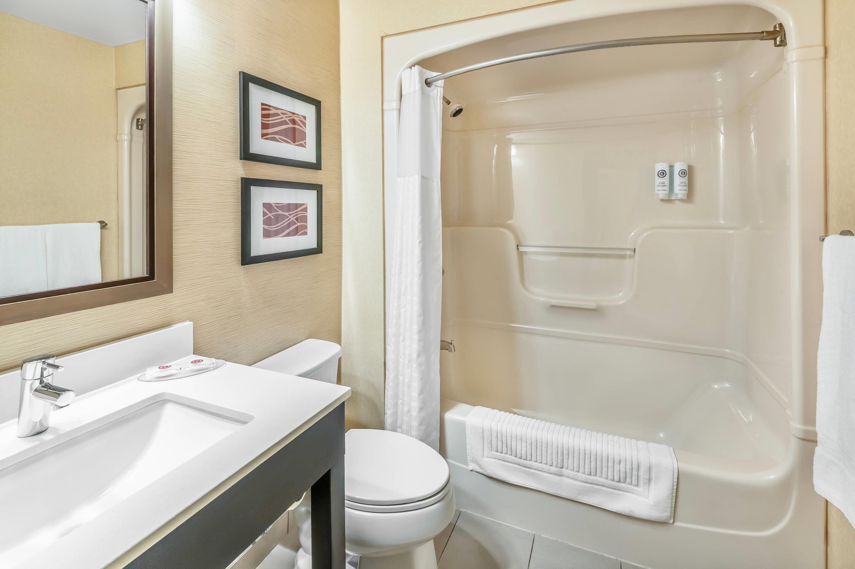 premium bedding, desk, blackout curtains, iron/ironing board