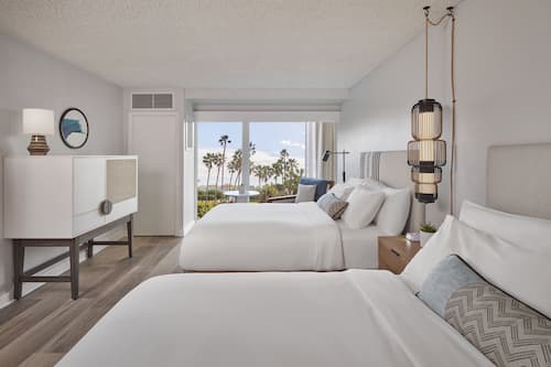 Premium bedding, pillow-top beds, in-room safe, laptop workspace