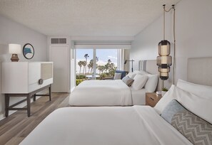 Premium bedding, pillow-top beds, in-room safe, laptop workspace