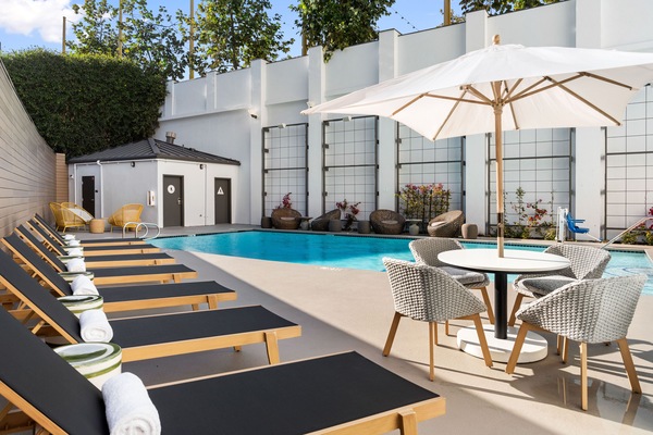 Outdoor pool, open 7:00 AM to 8:00 PM, sun loungers