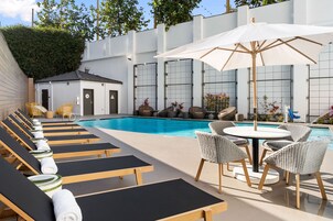 Outdoor pool, open 7:00 AM to 8:00 PM, sun loungers