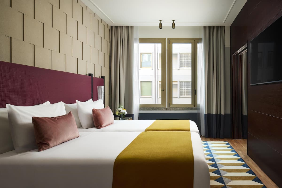 Hochwertige Bettwaren, Daunenbettdecken, Minibar, Zimmersafe