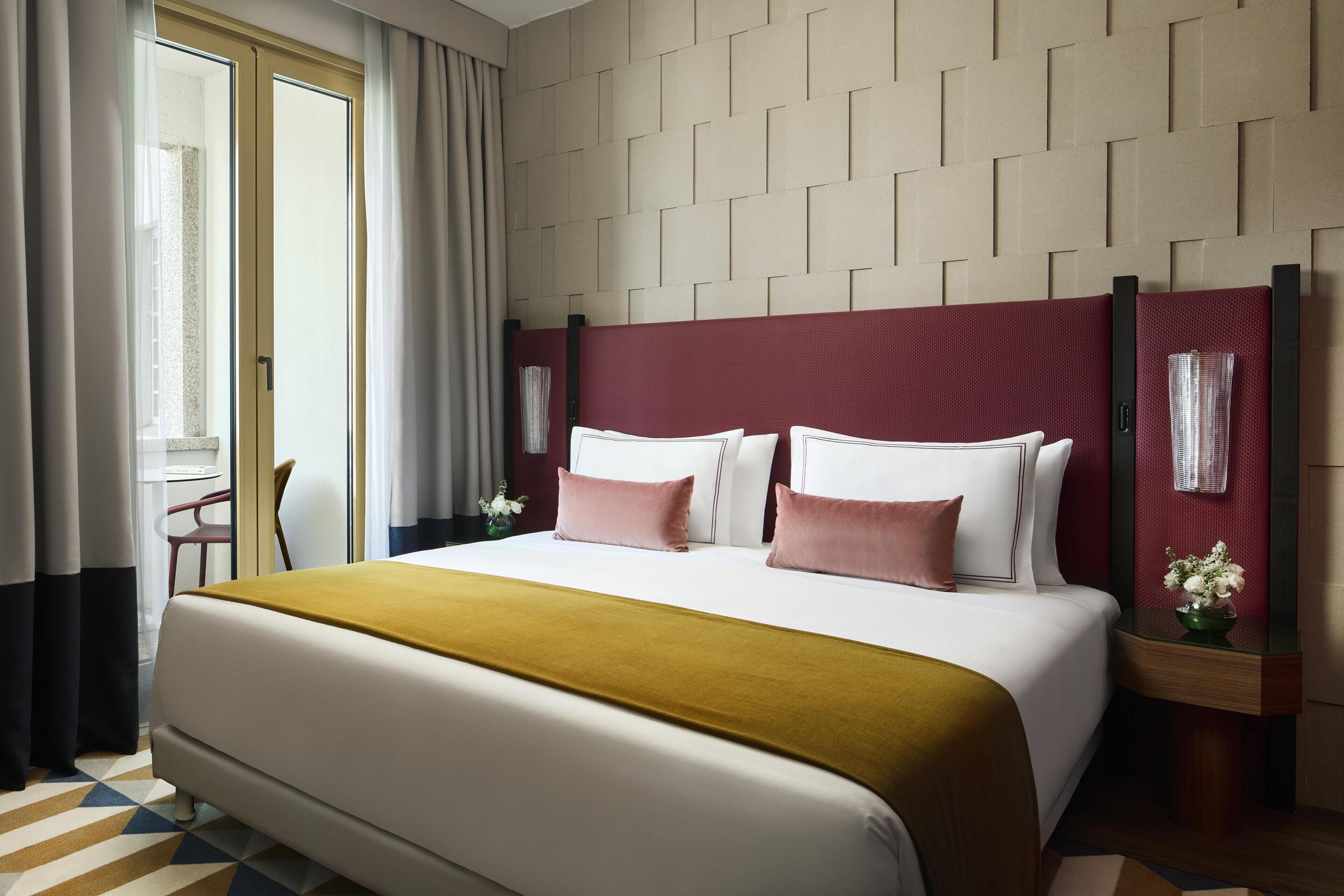 Premium bedding, down duvets, minibar, in-room safe