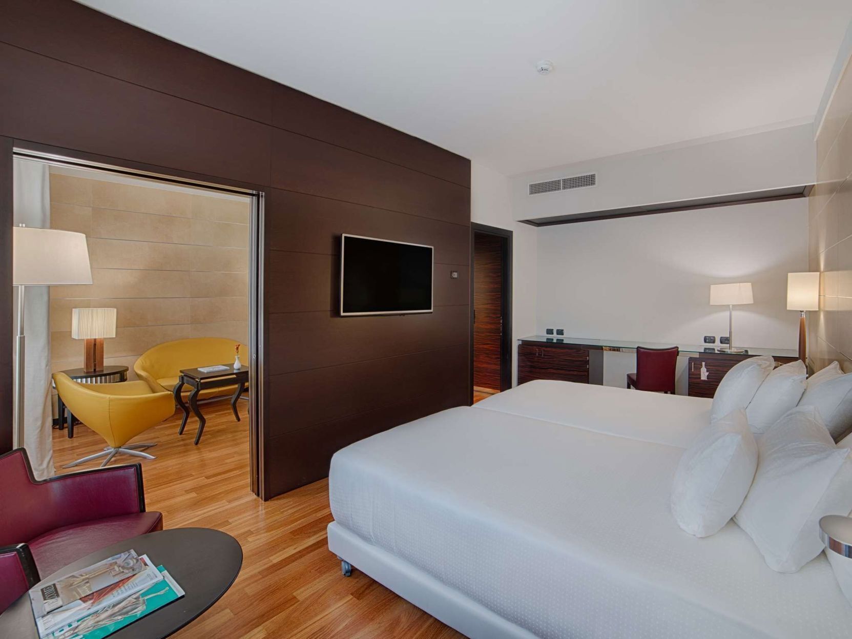 Premium bedding, down comforters, minibar, in-room safe