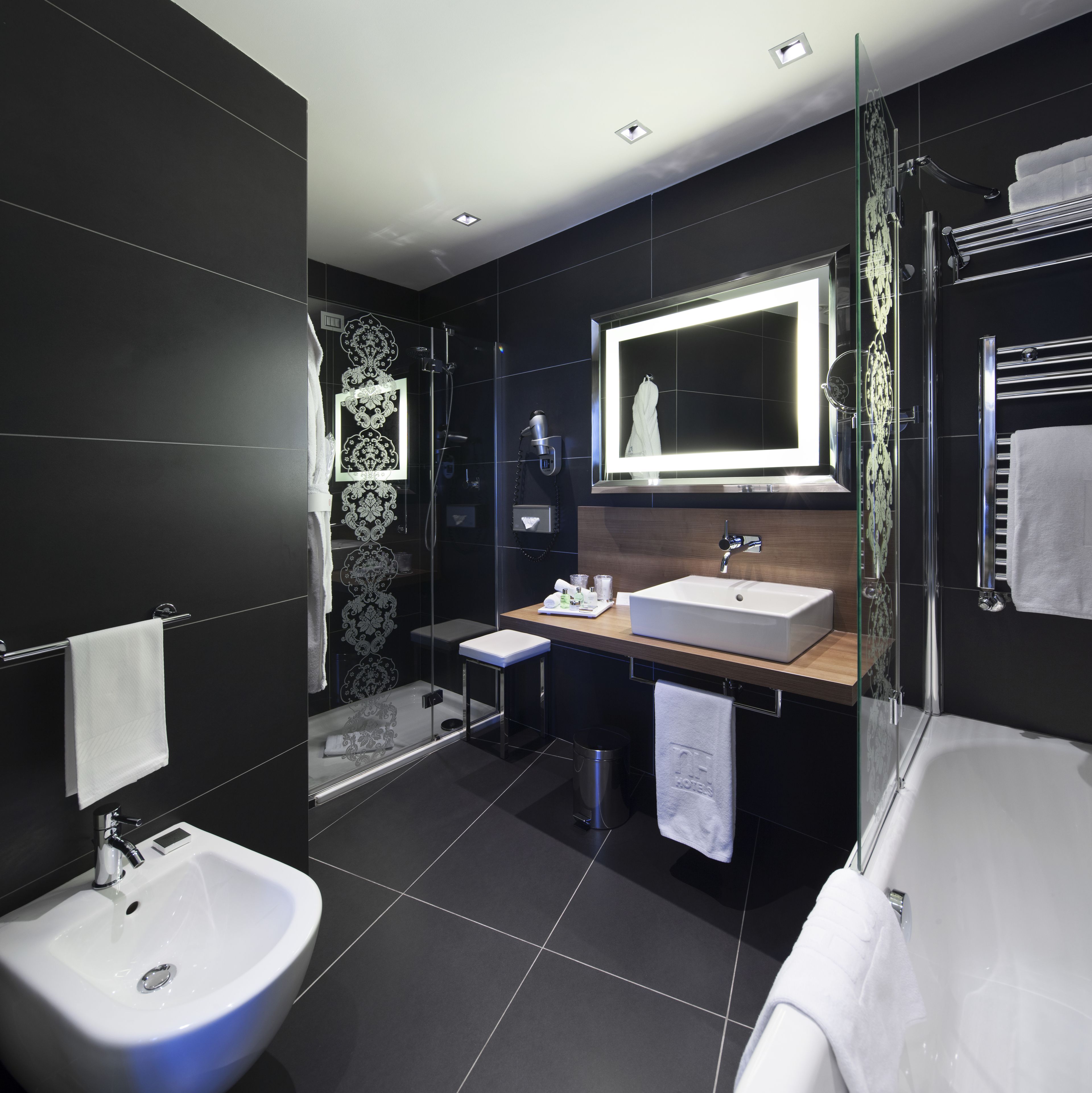 combined shower/bathtub, rainfall showerhead, designer toiletries