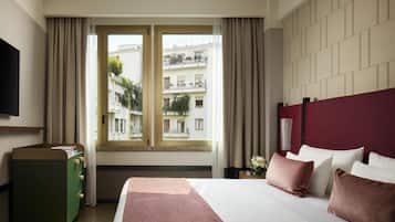 Premium bedding, down comforters, minibar, in-room safe