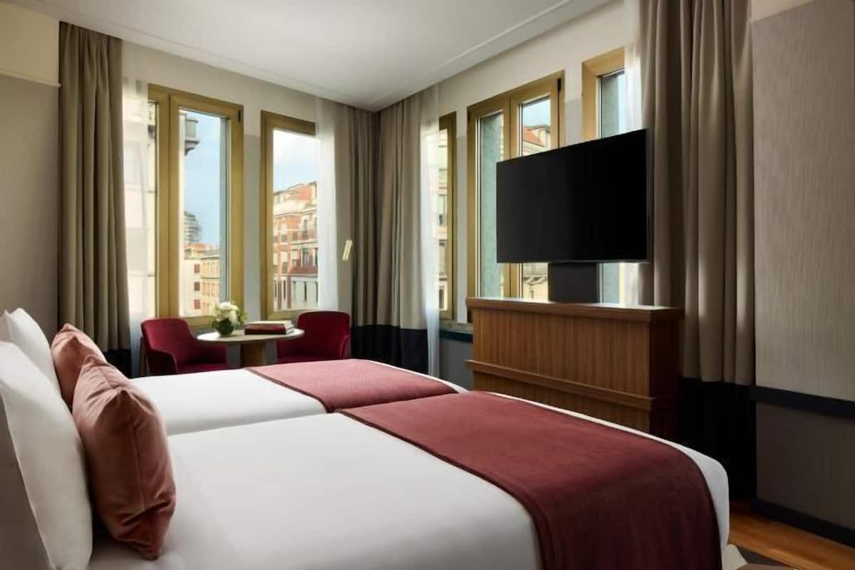 Premium bedding, down duvets, minibar, in-room safe