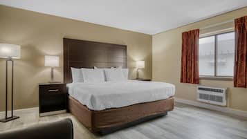 Standard Room, 1 King Bed, Non Smoking (Larger Room;with Sofabed) | Desk, laptop workspace, iron/ironing board, free WiFi