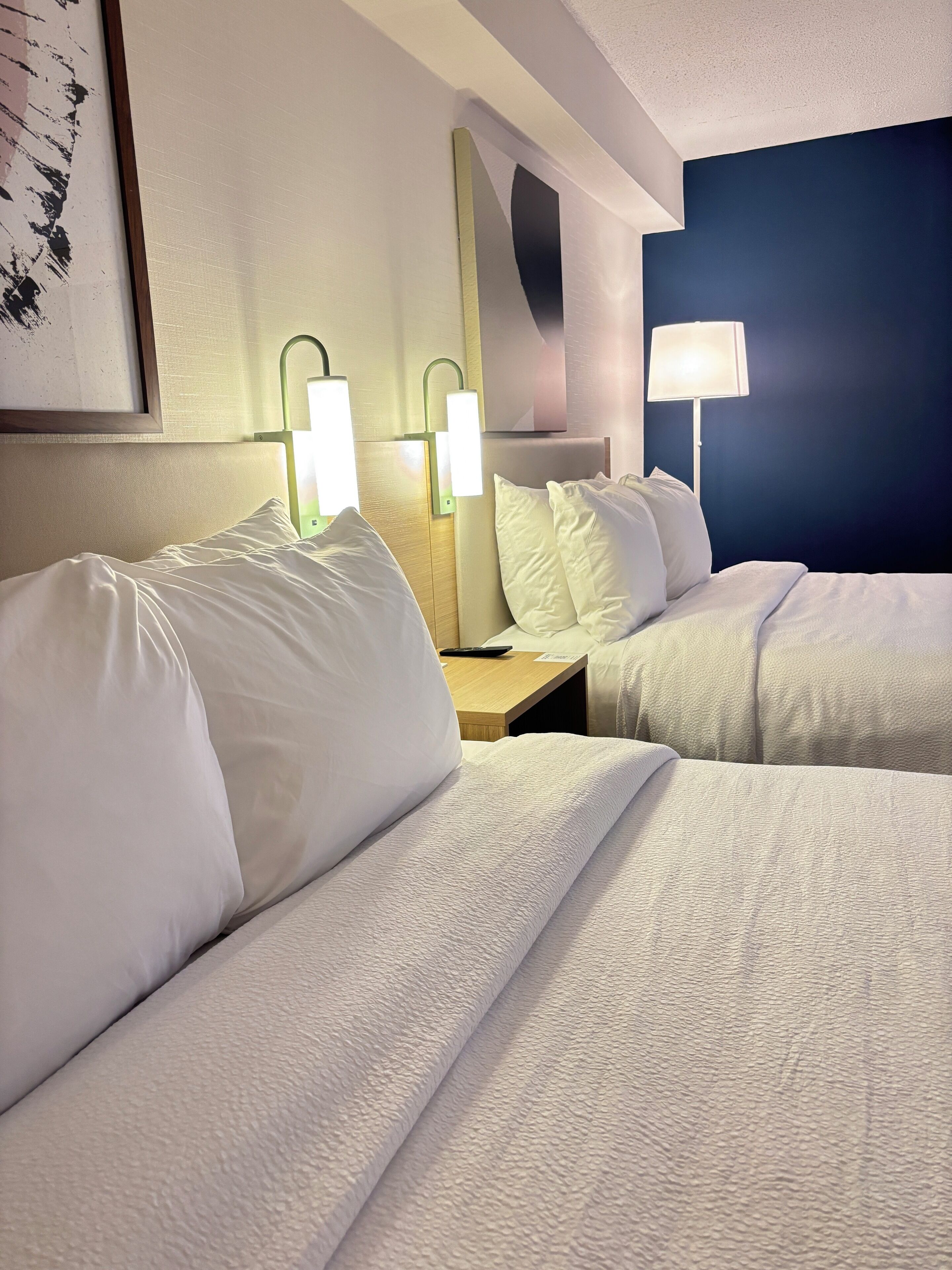 Room, 2 Queen Beds | Desk, blackout drapes, iron/ironing board, free cribs/infant beds