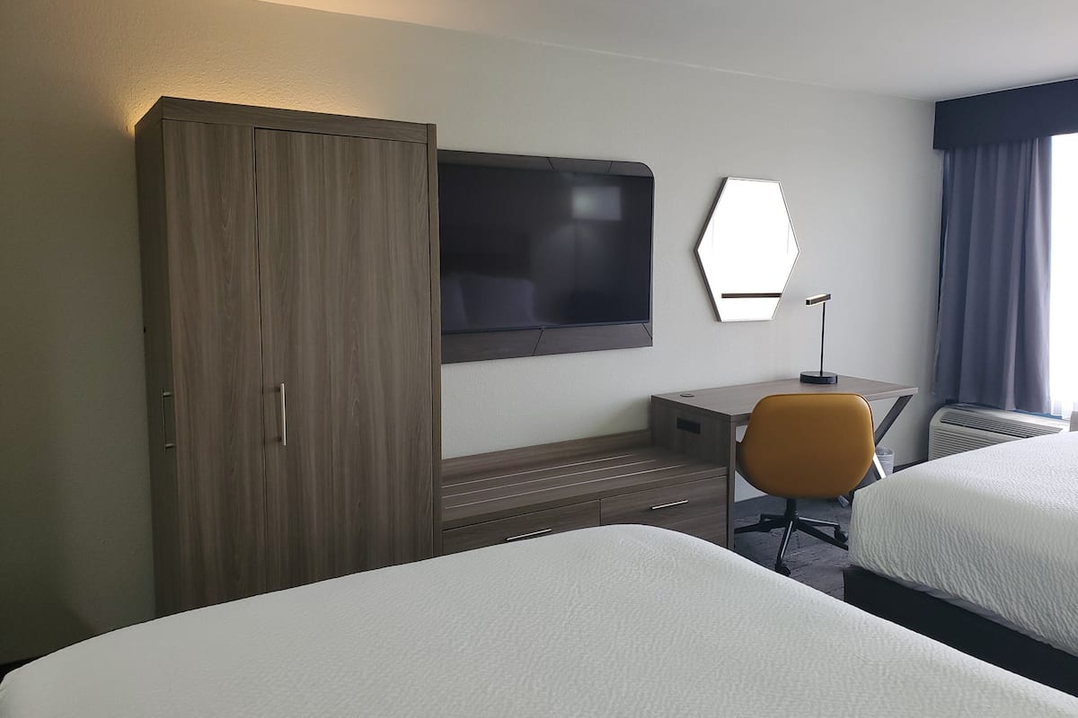 Luxe beddengoed, een kluis op de kamer, een bureau