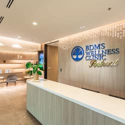 Guests can check in at the reception desk, surrounded by comfortable seating areas and a clean, modern atmosphere.