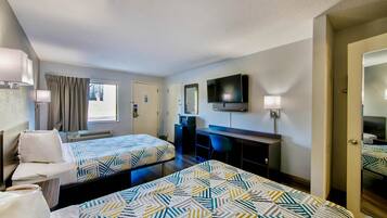 Premium bedding, desk, laptop workspace, rollaway beds