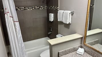 Combined shower/bathtub, hair dryer, towels, soap