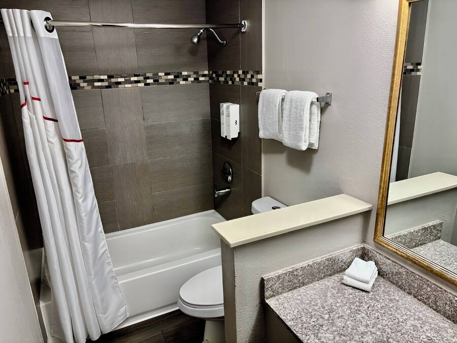 Combined shower/bathtub, hair dryer, towels, soap