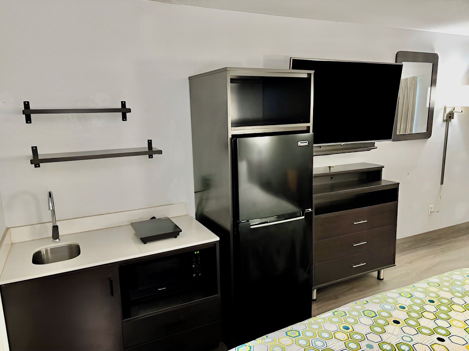 Full-sized fridge, microwave, stovetop, coffee/tea maker