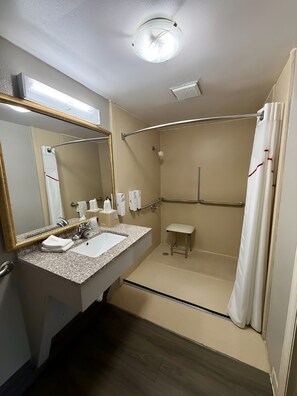 Studio, 1 King Bed, Roll-in Shower, Non Smoking (Roll-In Shower) | Bathroom | Combined shower/tub, hair dryer, towels, soap - HomeTowne Studios by Red Roof Birmingham (Birmingham)