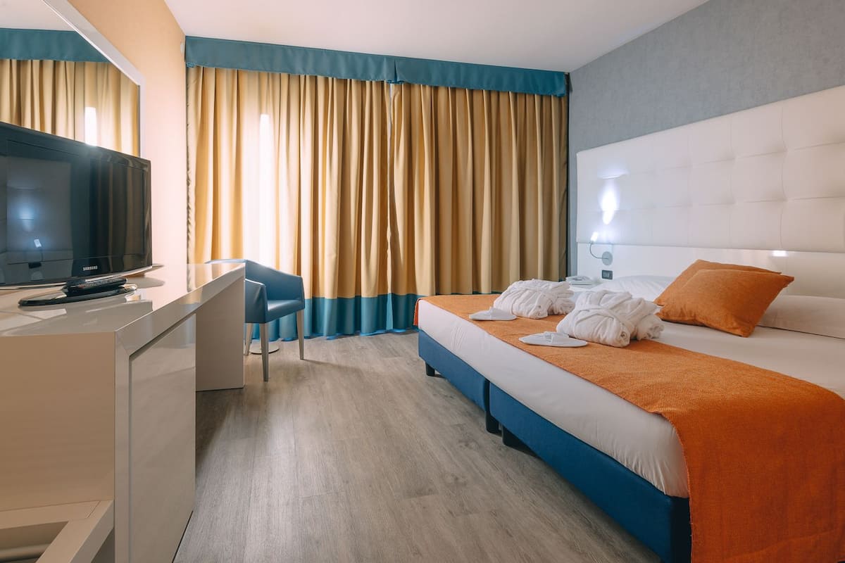 Chambre Double Deluxe | Literie hypoallergénique, minibar, coffres-forts dans les chambres