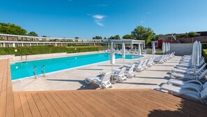 Seasonal outdoor pool, pool umbrellas, sun loungers