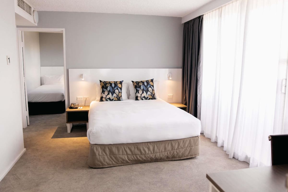 Family Room, Multiple Beds, Balcony | Premium bedding, pillow-top beds, in-room safe, desk