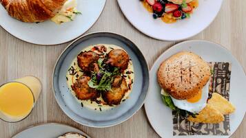 Daily buffet breakfast (AUD 29 per person)