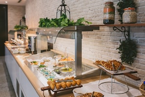 Daily buffet breakfast (AUD 29 per person)