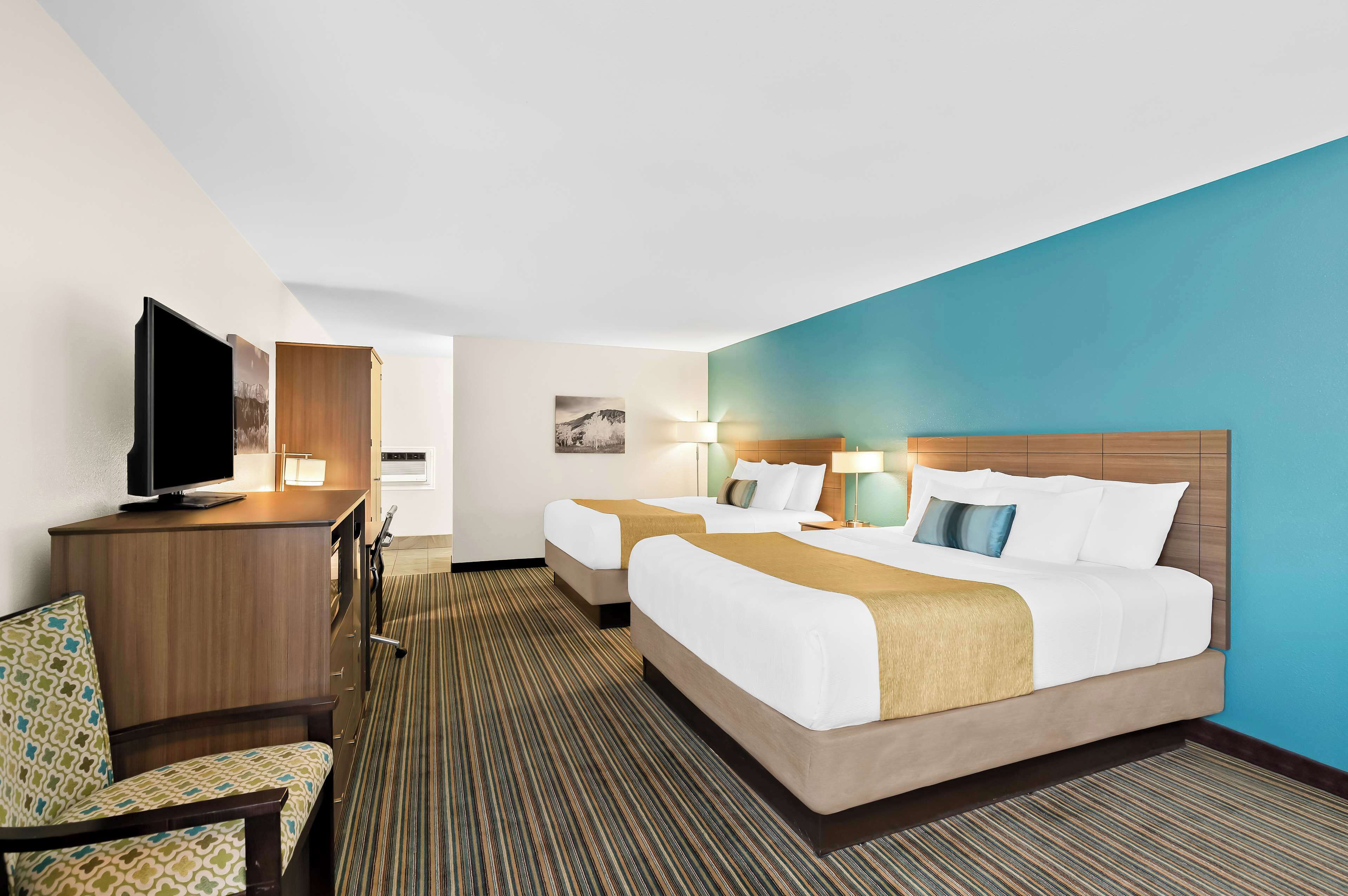 standard room, multiple beds, non smoking, refrigerator & microwave (larger room) | desk, blackout curtains, iron/ironing board, free cots/infant beds