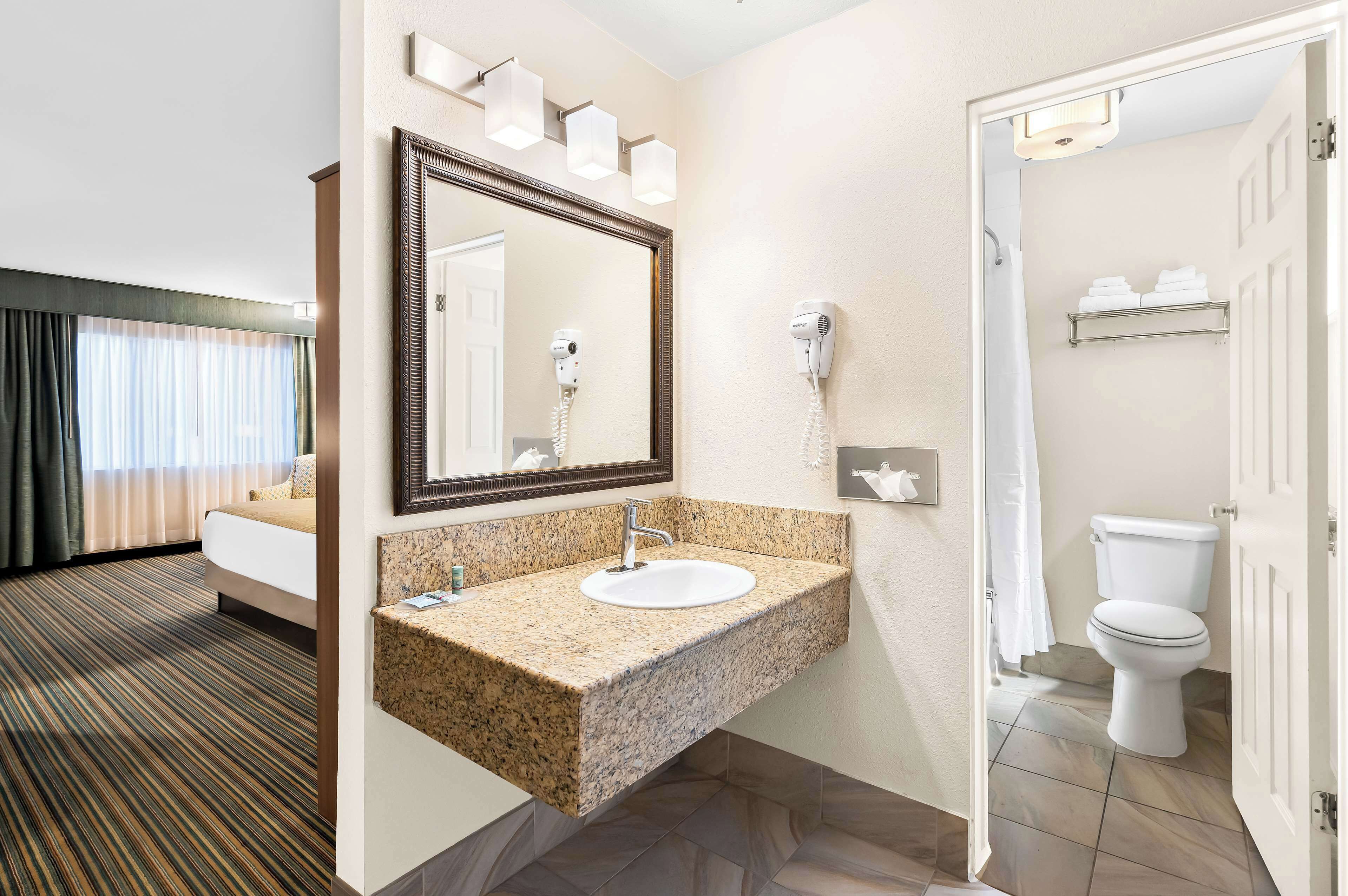 desk, blackout curtains, iron/ironing board, free cots/infant beds