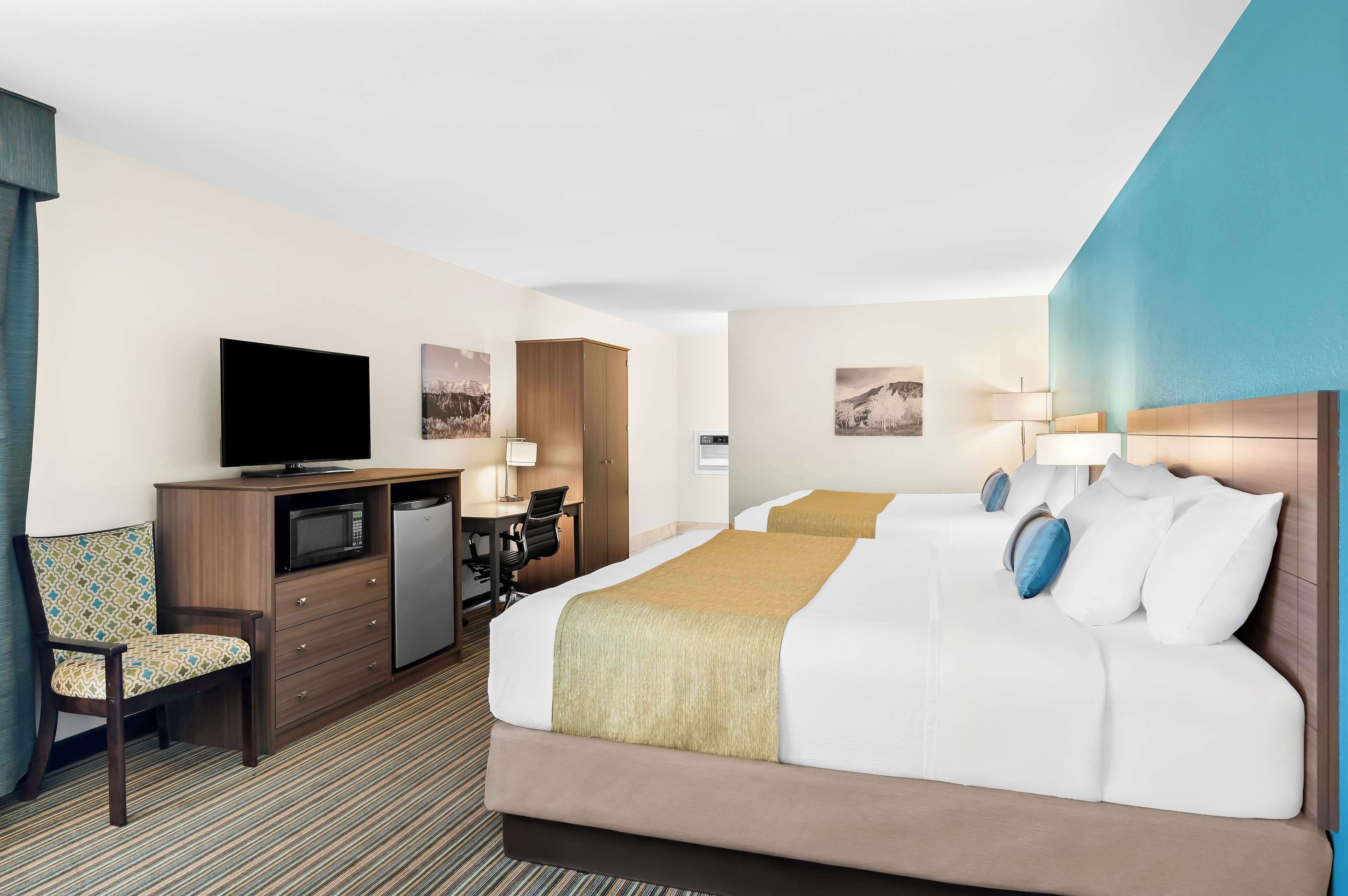 standard room, multiple beds, non smoking, refrigerator & microwave (larger room) | desk, blackout curtains, iron/ironing board, free cots/infant beds