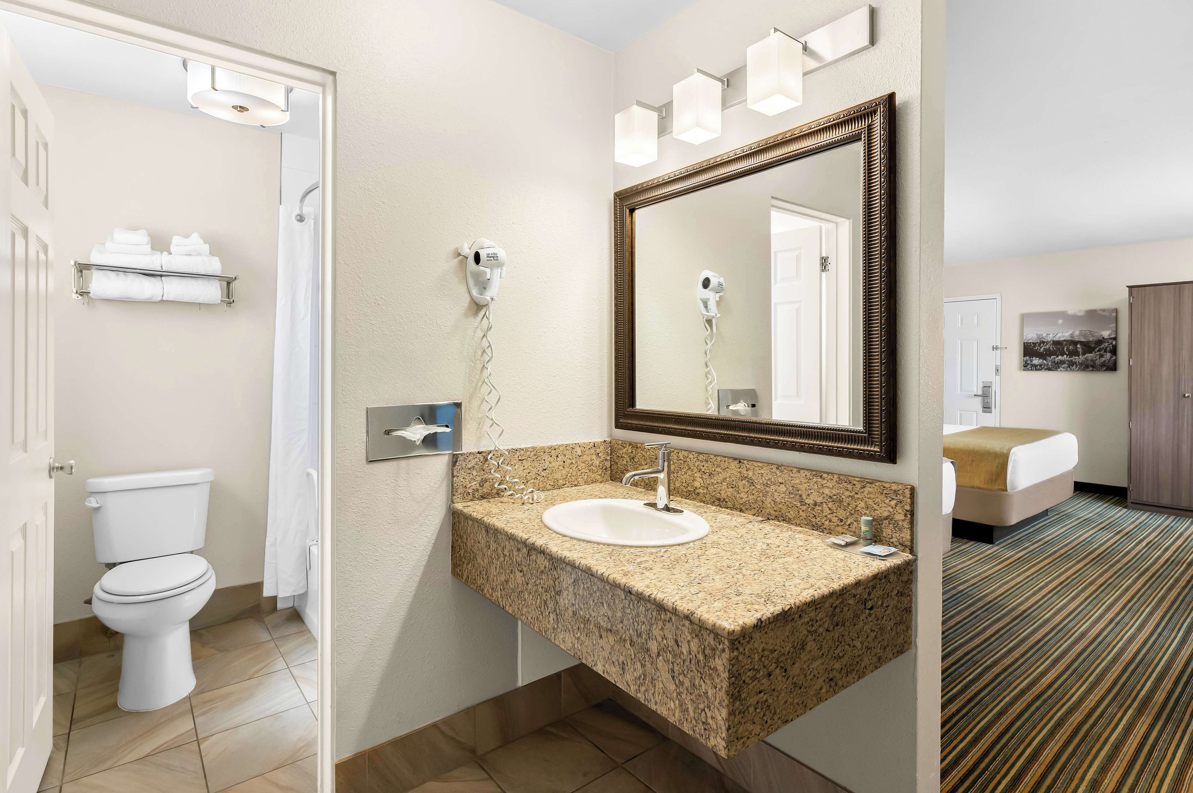 desk, blackout curtains, iron/ironing board, free cots/infant beds