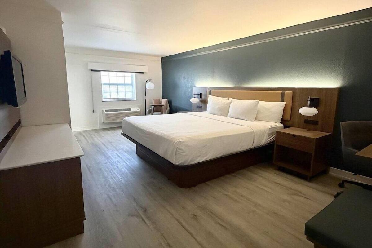 Premium bedding, desk, blackout drapes, iron/ironing board