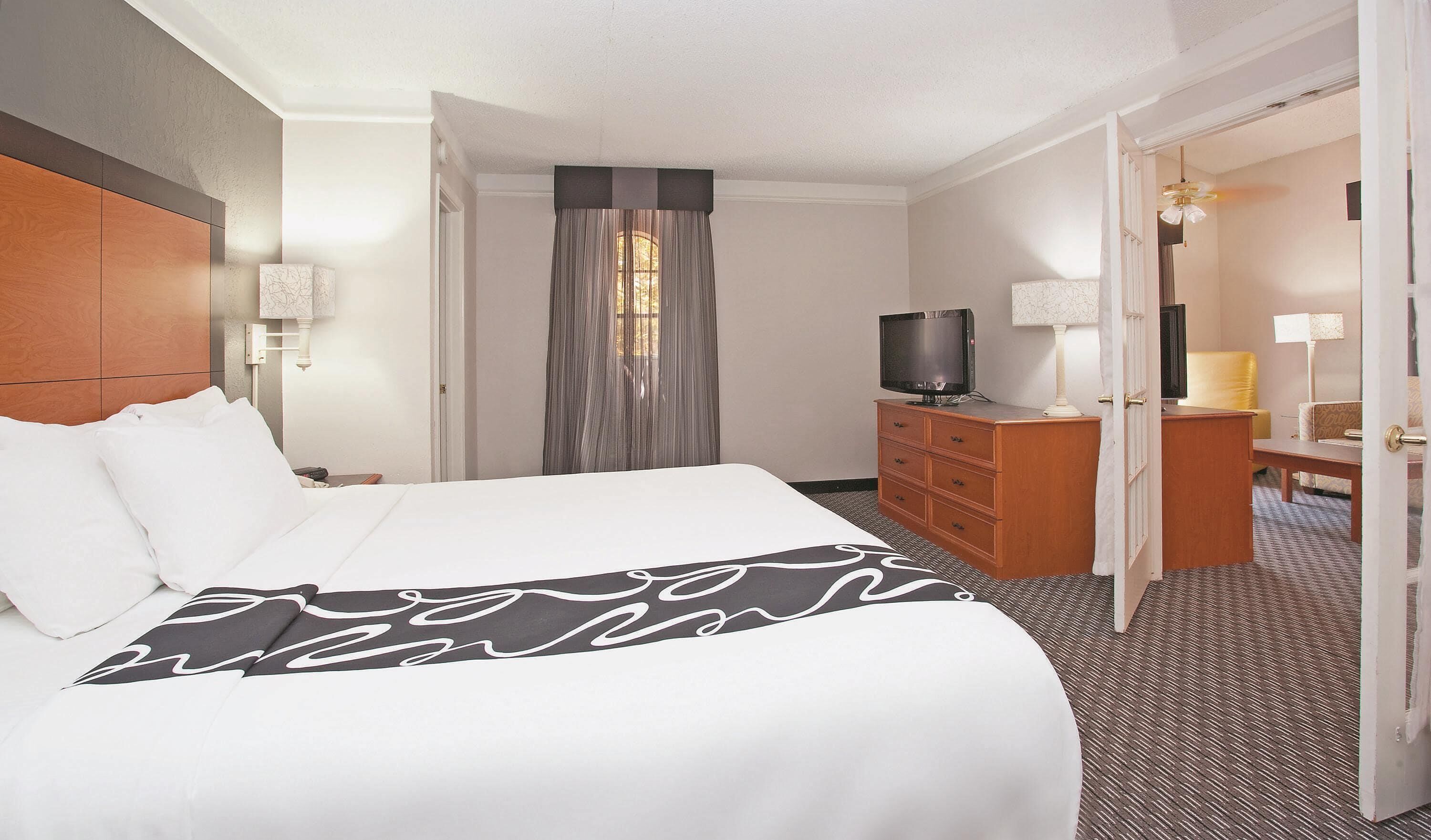 Premium bedding, desk, blackout drapes, iron/ironing board