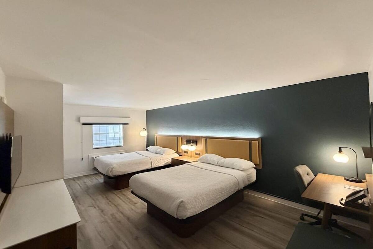 Premium bedding, desk, blackout drapes, iron/ironing board