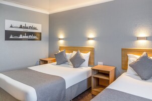 Family Room (2 Adults + 1 Child) | In-room safe, desk, free WiFi, bed sheets