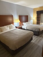 Standard Room, 2 Queen Beds, Non Smoking | Desk, iron/ironing board, free cribs/infant beds, rollaway beds