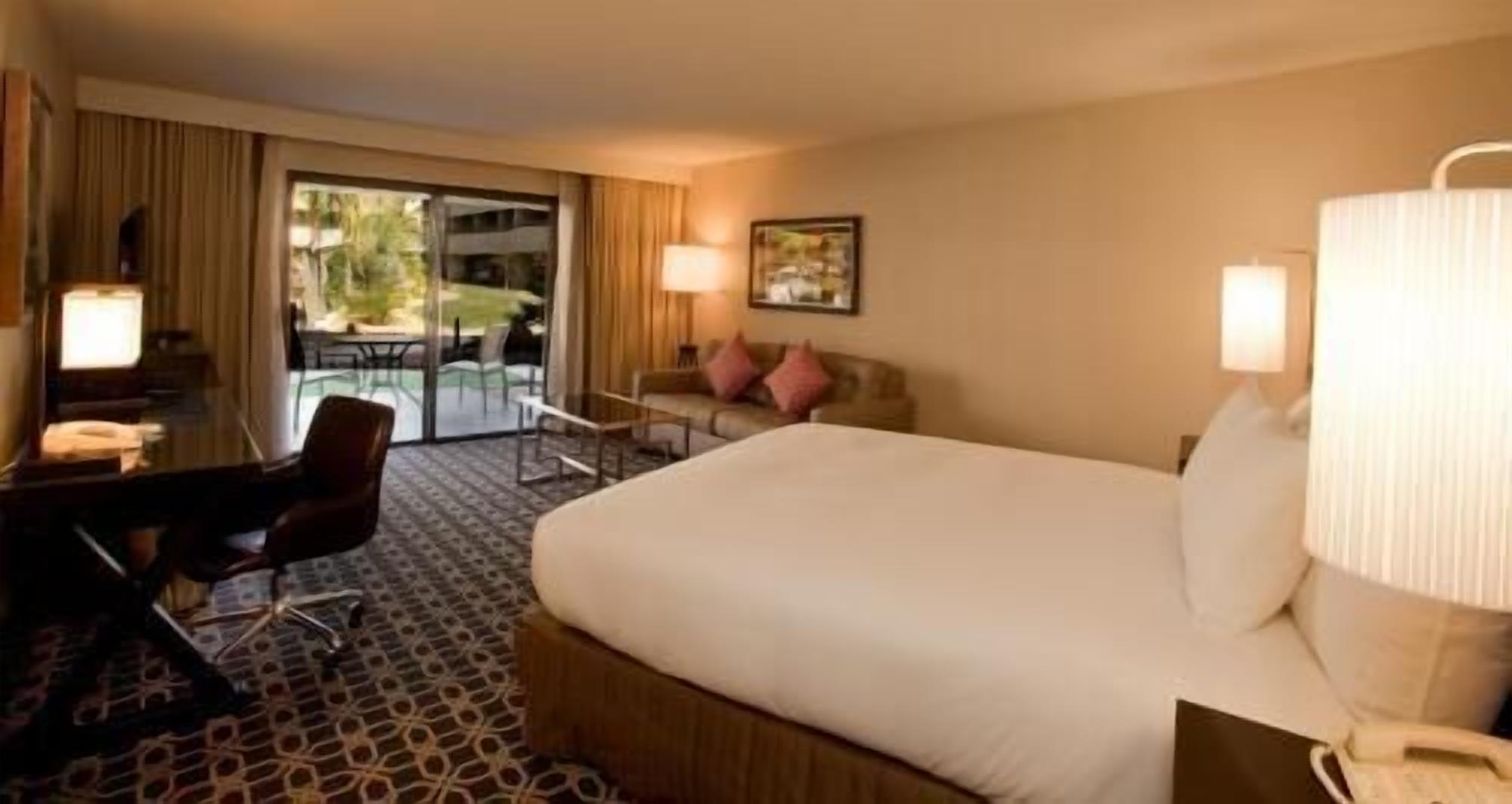 Premium bedding, down duvets, pillow-top beds, in-room safe