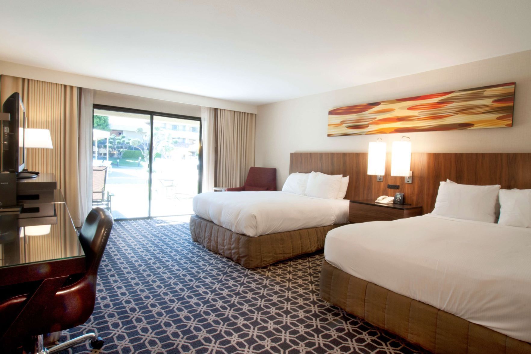 Premium bedding, down duvets, pillow-top beds, in-room safe
