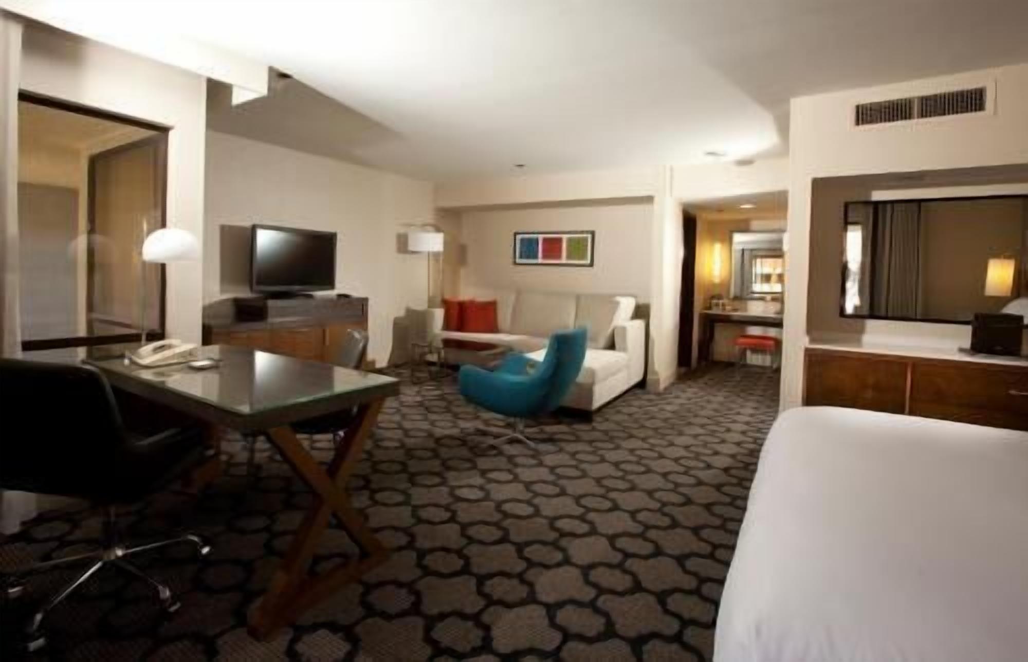 Premium bedding, down duvets, pillow-top beds, in-room safe