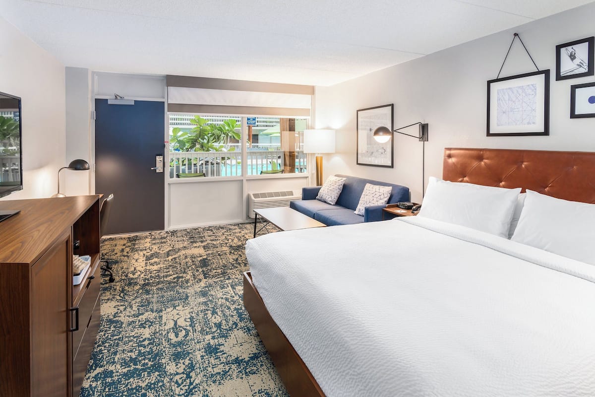 Room, 1 King Bed with Sofa bed, Non Smoking, Pool View (Poolside) | Desk, iron/ironing board, free cribs/infant beds, free WiFi