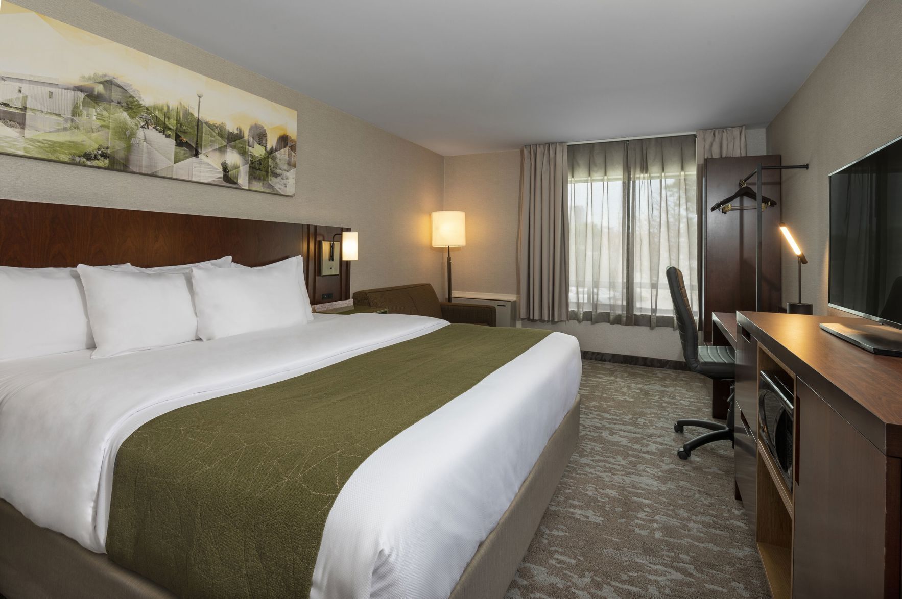 Pillowtop beds, desk, blackout drapes, iron/ironing board